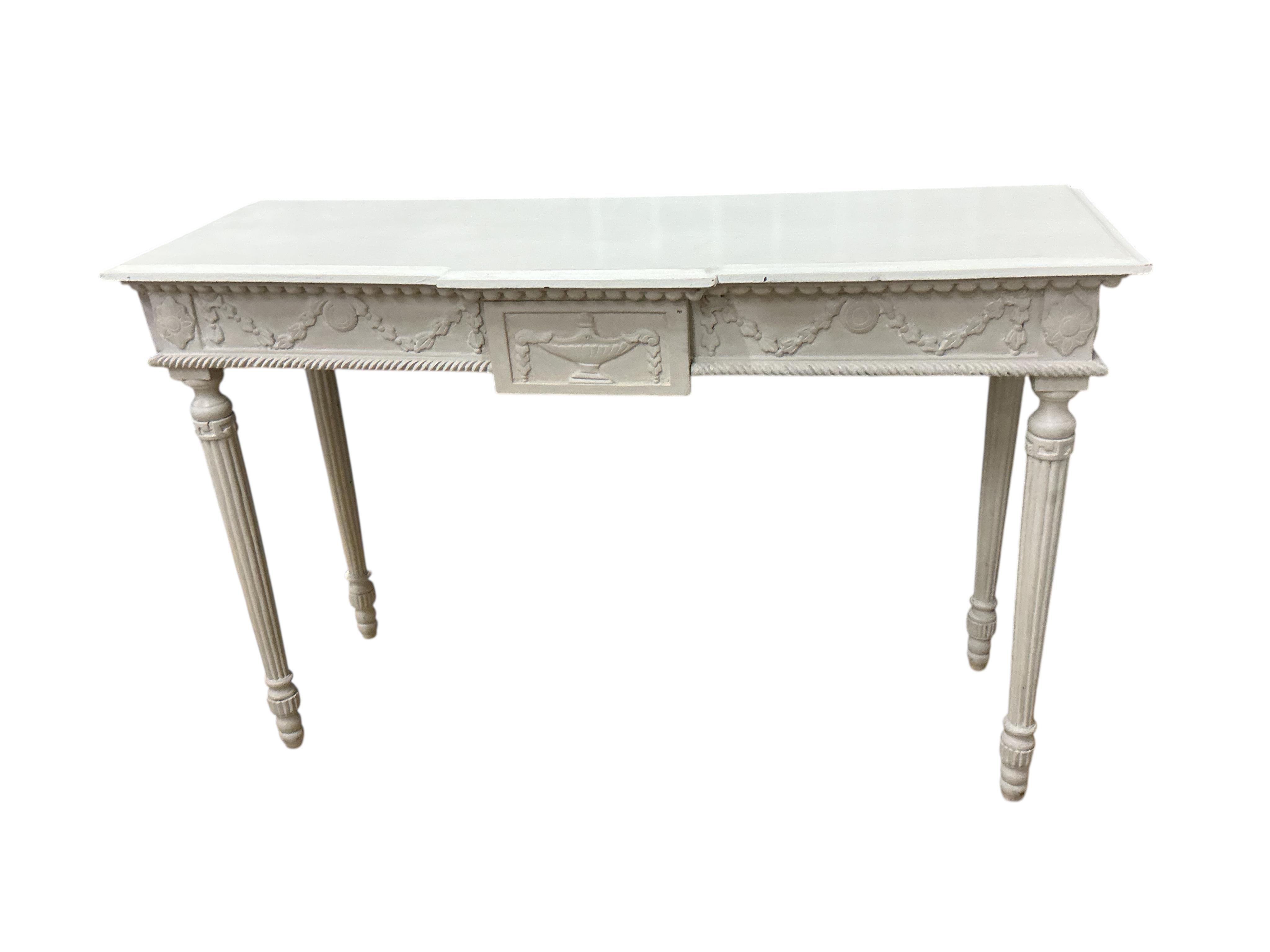 An Adam style painted breakfront console table, width 124cm, depth 41cm, height 81cm
